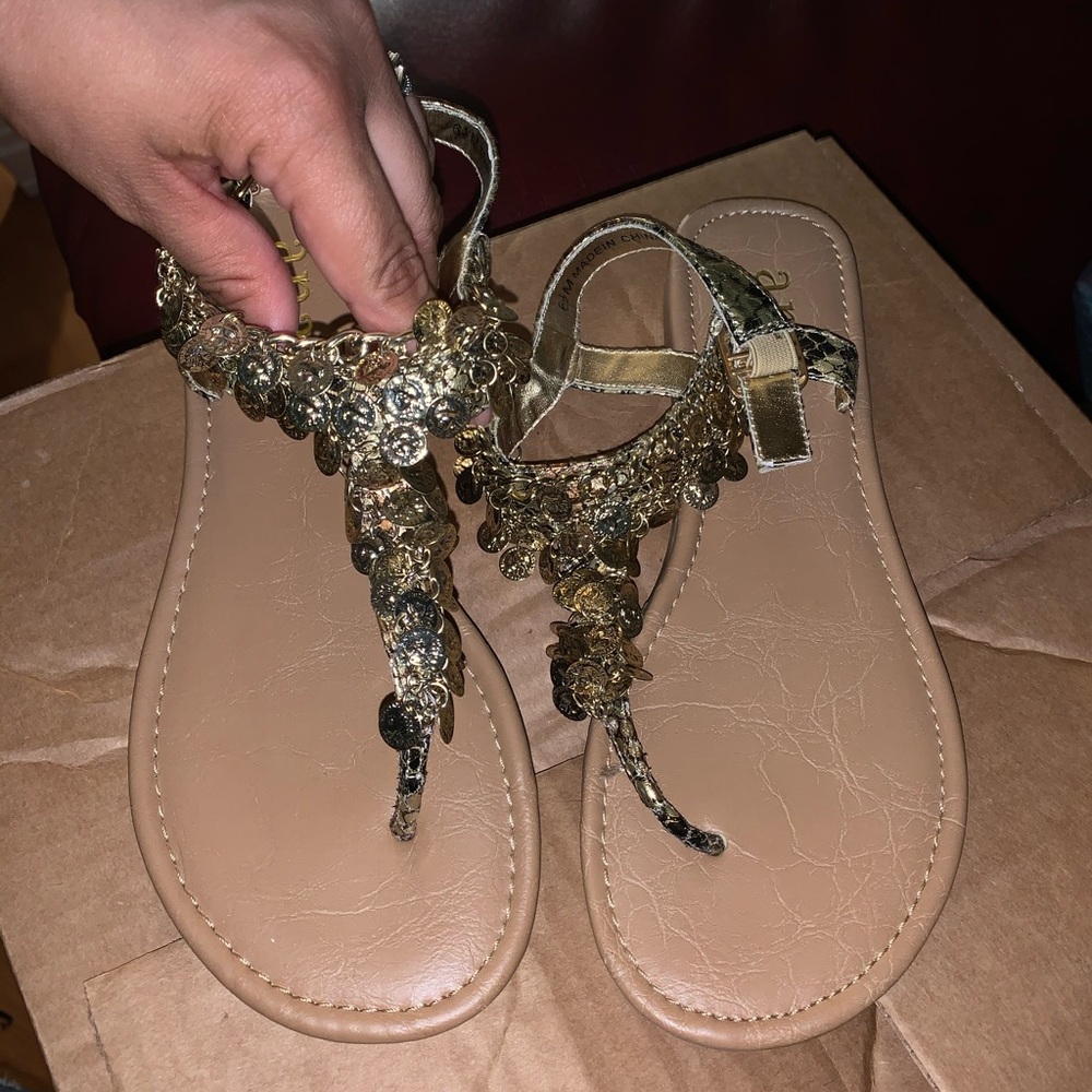 Gold medallion sandals